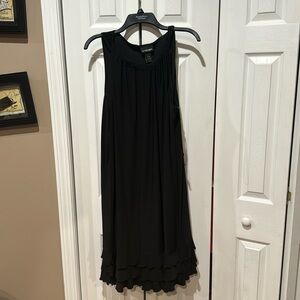 Black cocktail dress with ruffle detail